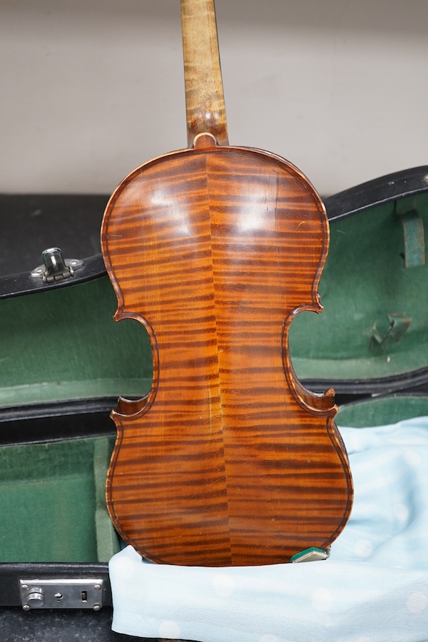 Three violins; a 3/4 Czech, a 1/2 size German and a 1/4 size Czech, all cased. Condition - fair to good